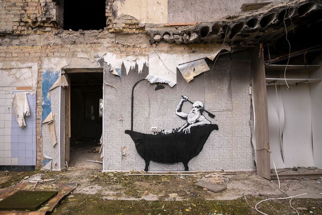 A photo of a mural on a war-torn wall