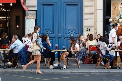 Eating lunch at a Parisian cafe in the The Rue Montorgueil district is one thing to do in Paris in 1...