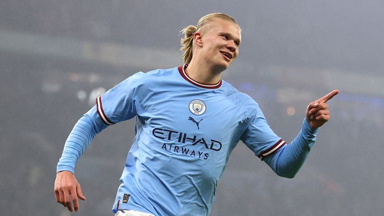 Man City&#39;s Erling Haaland celebrates after scoring against Liverpool