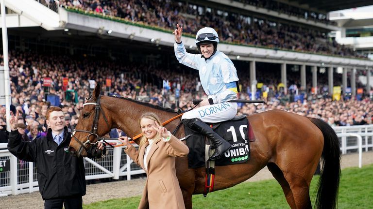 Rachael Blackmore and Honeysuckle pose for the cameras after victory in the 2022 Champion Hurdle at Cheltenham