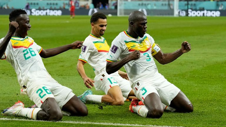 Senegal&#39;s Kalidou Koulibaly celebrates with team-mates