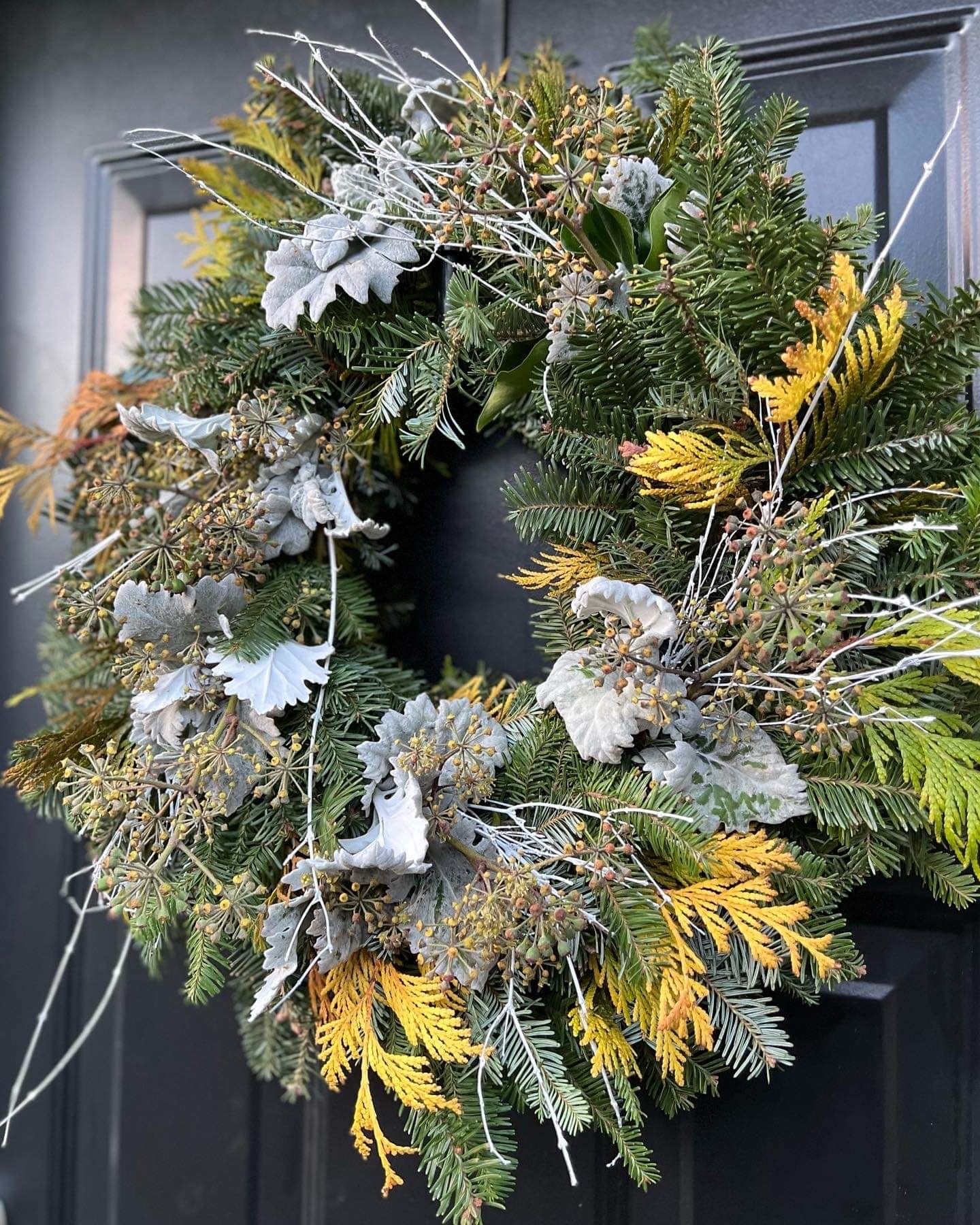winter wreath with gold and silver foliage
