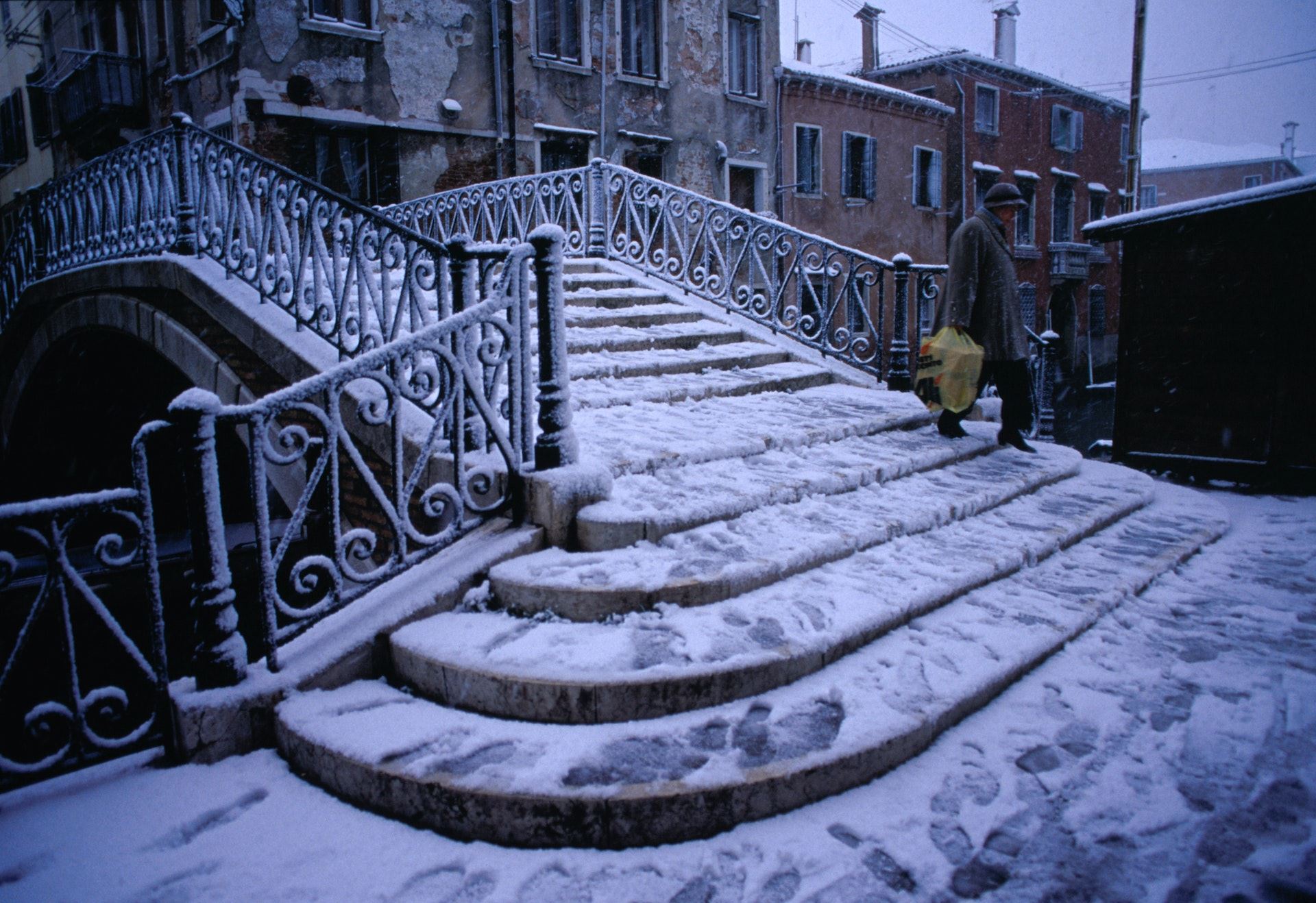 Snow covers Fondamenta della Sensa, the bridge that leads to the historic Jewish quarter.