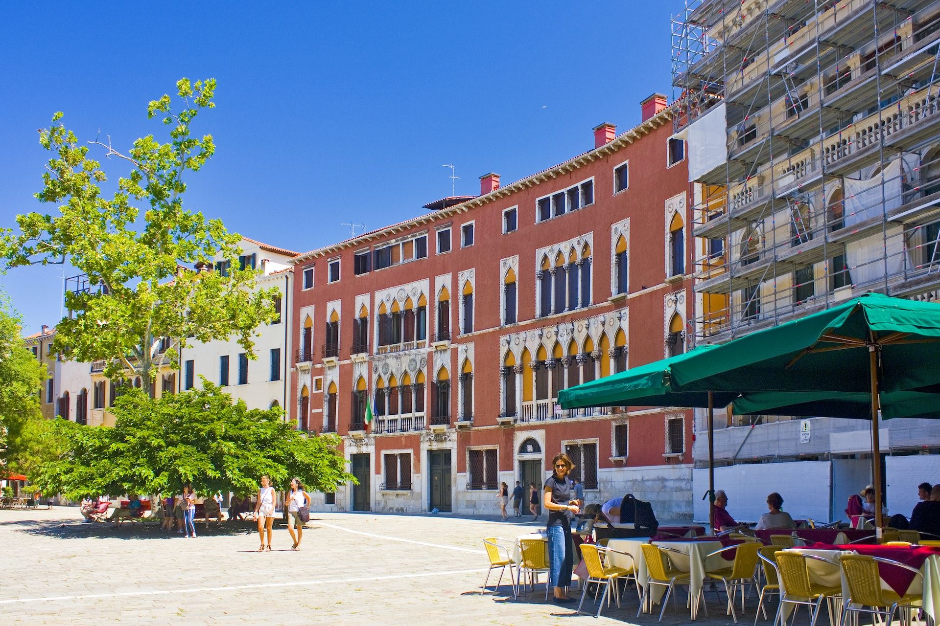 Sunshine and outdoor tables in Square Campo San Polo in Venice