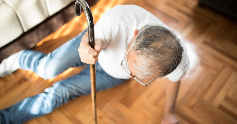 1200 fallen man with cane